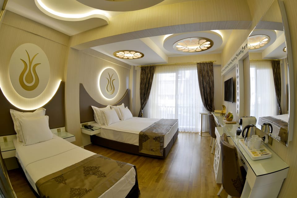 Superior Room (Triple) | Minibar, in-room safe, blackout drapes, free WiFi