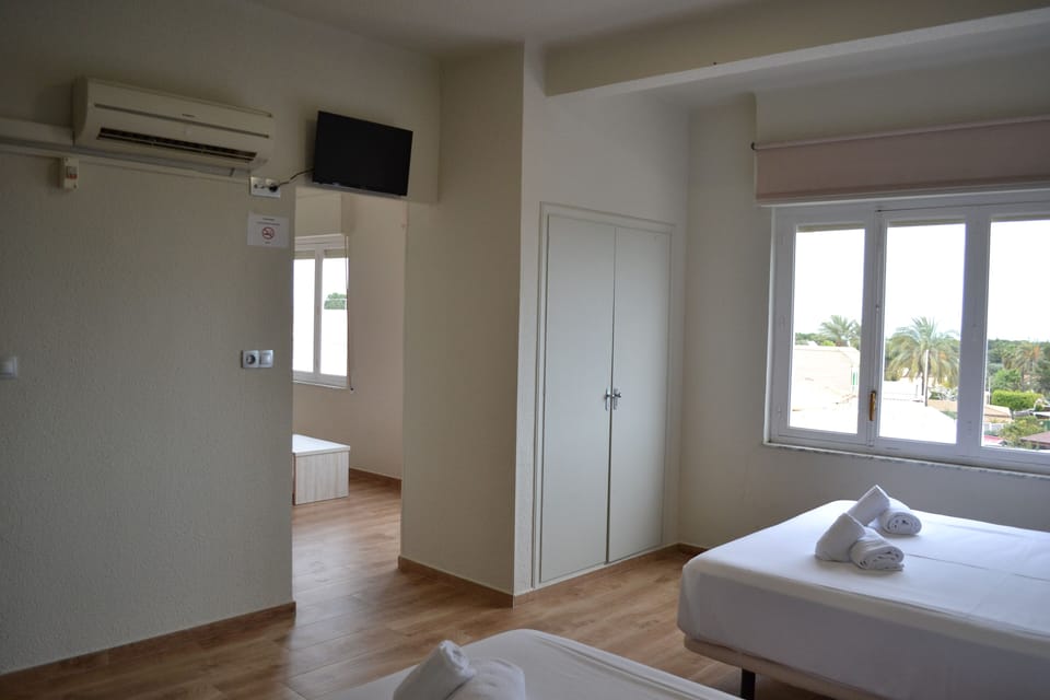 Comfort Quadruple Room, 1 Bedroom, Partial Ocean View | Free WiFi, bed sheets