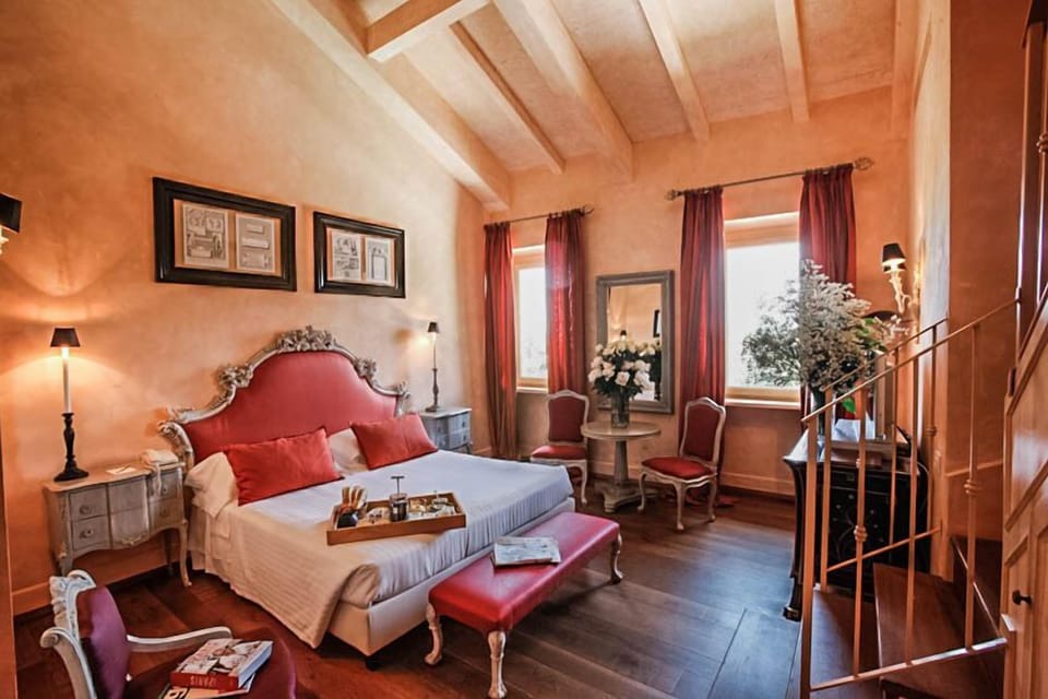 Deluxe Room (with mezzanine) | Minibar, in-room safe, desk, laptop workspace