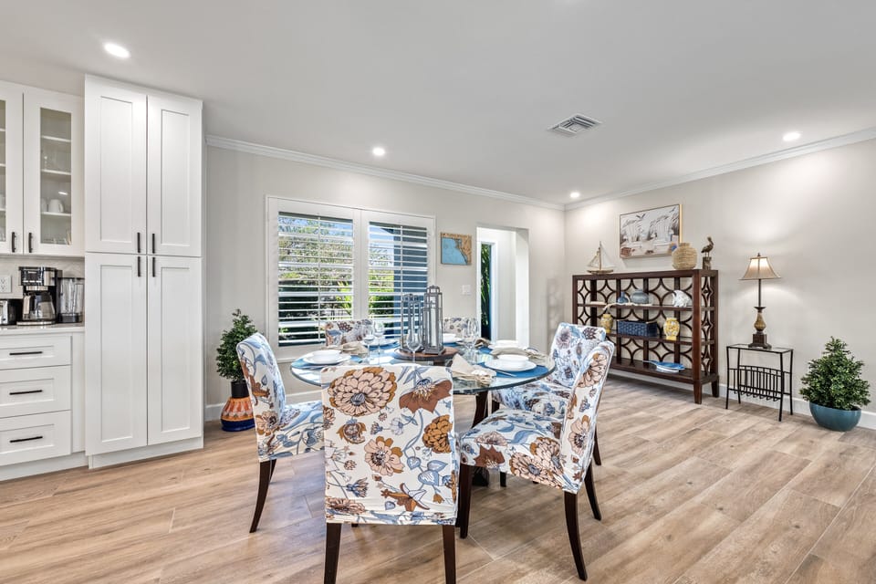 Dining area "look-back" with foyer main entrance in distance.
