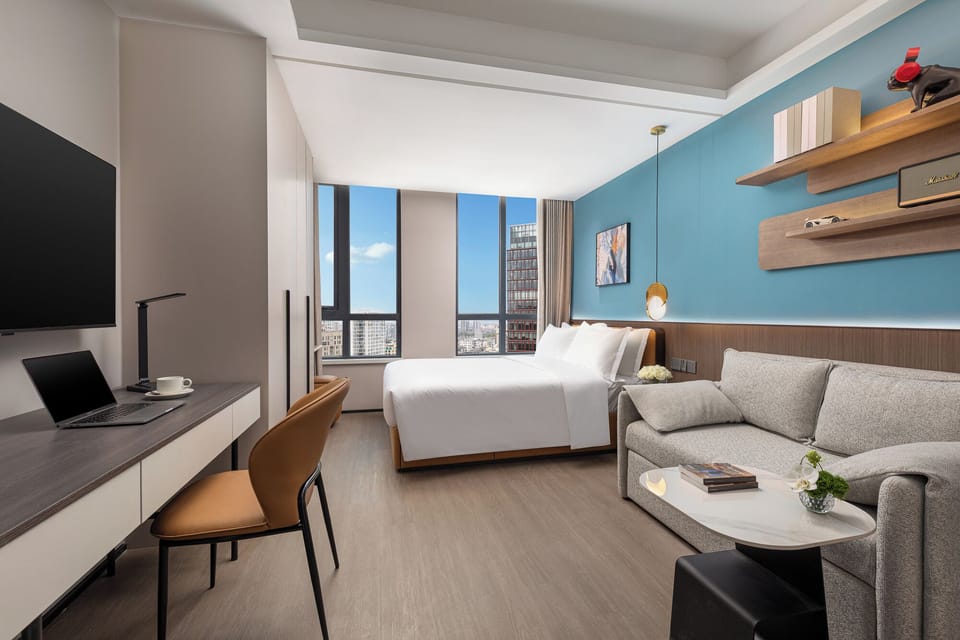 Deluxe Studio | In-room safe, desk, laptop workspace, blackout drapes