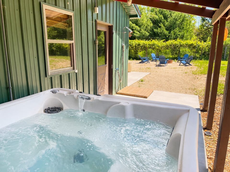 Soak up the peace and quiet in the hot tub.