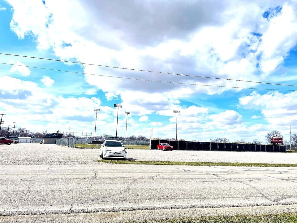 Large Public Parking Area Across the Street from House