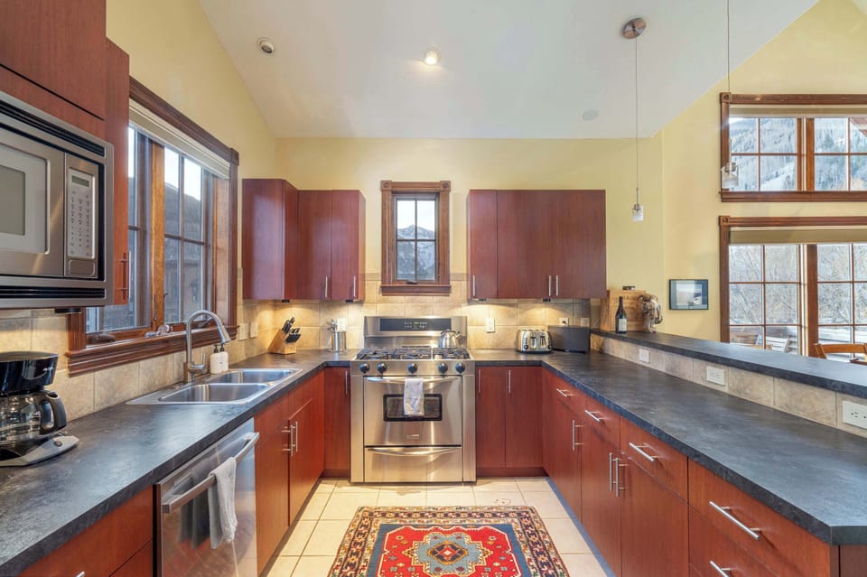 Kitchen: Third floor, drip coffee maker, Keurig, toaster, french press cooking utensils, tableware