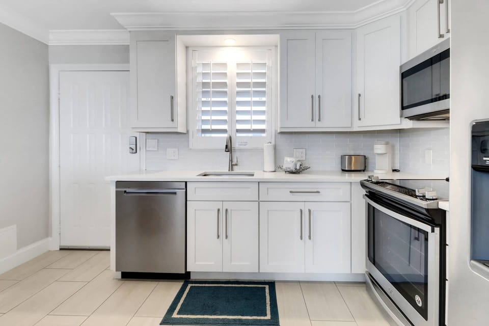 Cookware, dinnerware, many kitchen tools and small appliances are provided for your use, including a Keurig coffee maker.