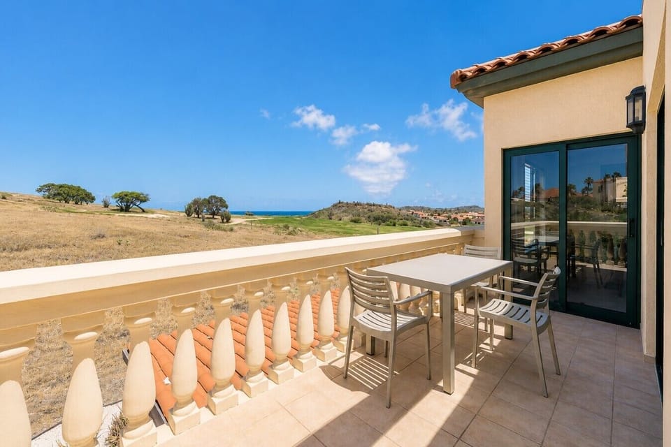 Private balcony with seating, scenic views, and a peaceful space to relax outdoors.