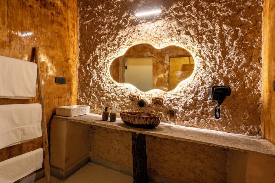 Superior Suite room | Bathroom | Designer toiletries, hair dryer, slippers, towels