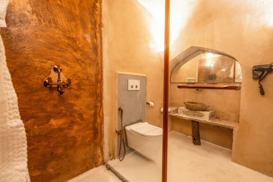 Royal Suite room with Bathtub | Bathroom | Designer toiletries, hair dryer, slippers, towels