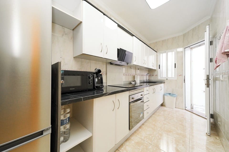 Villa | Private kitchen | Fridge, microwave, oven, stovetop