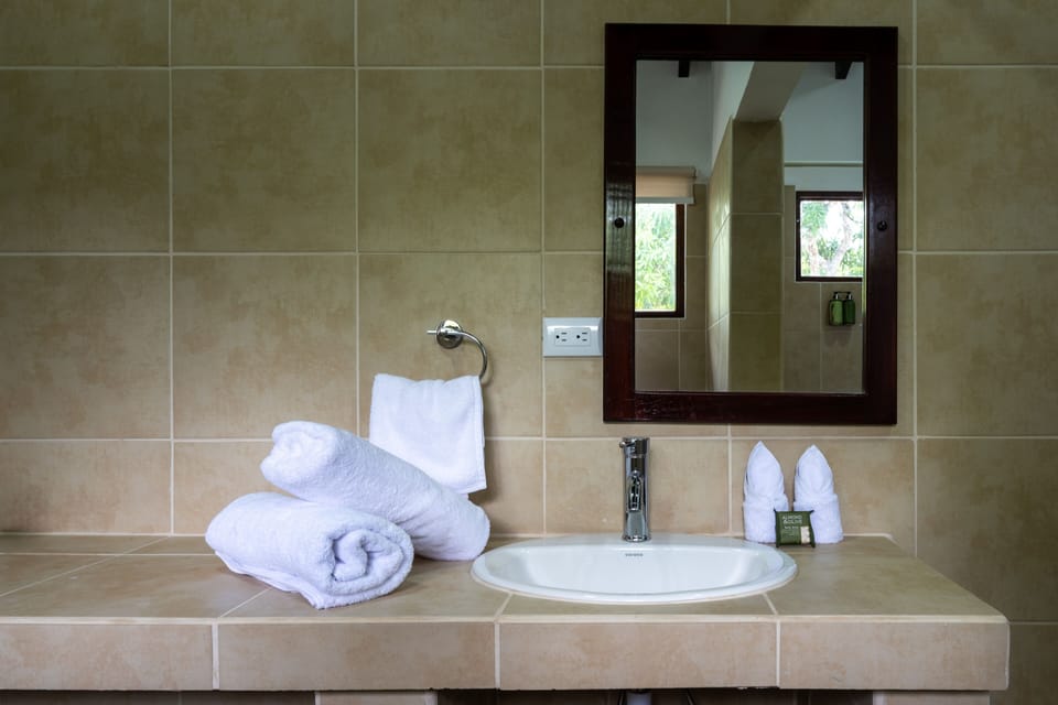 Superior Two Bedroom | Bathroom | Shower, rainfall showerhead, eco-friendly toiletries, towels