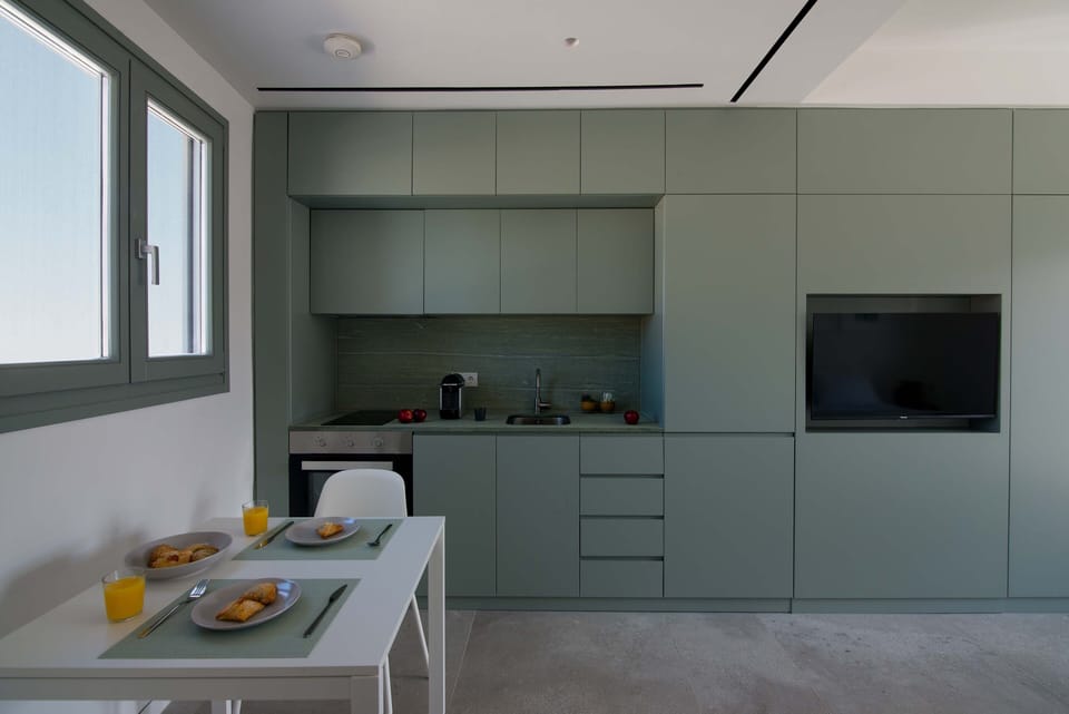 Comfort Apartment, 1 Queen Bed, City View | 1 bedroom, in-room safe, soundproofing, iron/ironing board