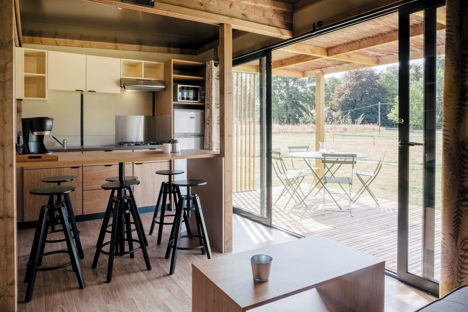 Family Chalet | Private kitchen | Coffee/tea maker, highchair, cleaning supplies