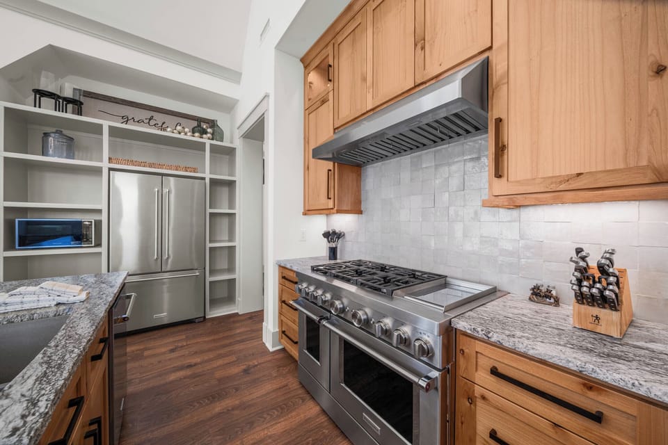 High End Stainless Appliances and Granite Countertops