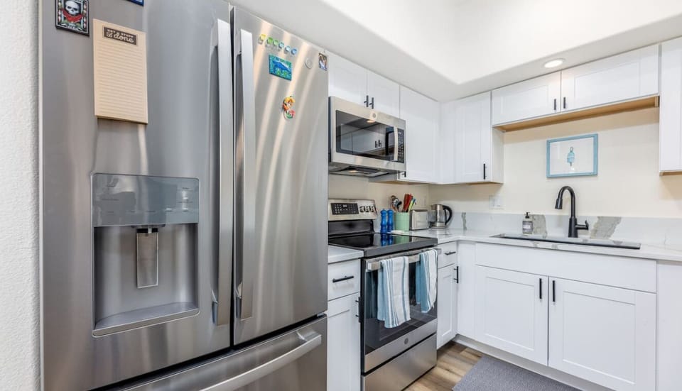 The fully equipped kitchen offers counter space, appliances, and all the essentials needed to cook your meals at home. Pantry staples such as olive oil, spices, coffee, and condiments are provided to minimize your grocery shopping.