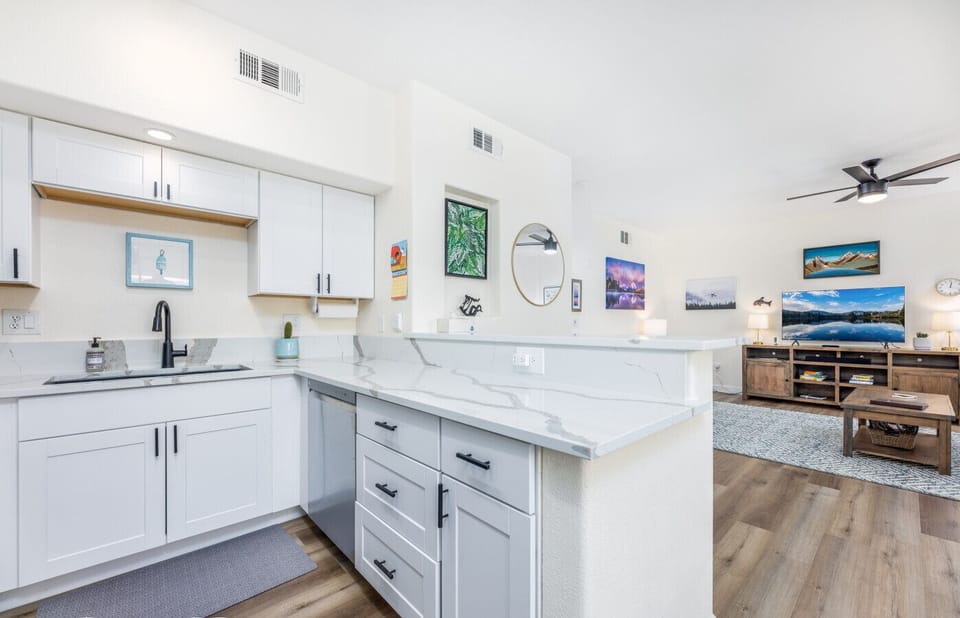 The fully equipped kitchen offers counter space, appliances, and all the essentials needed to cook your meals at home. Pantry staples such as olive oil, spices, coffee, and condiments are provided to minimize your grocery shopping.