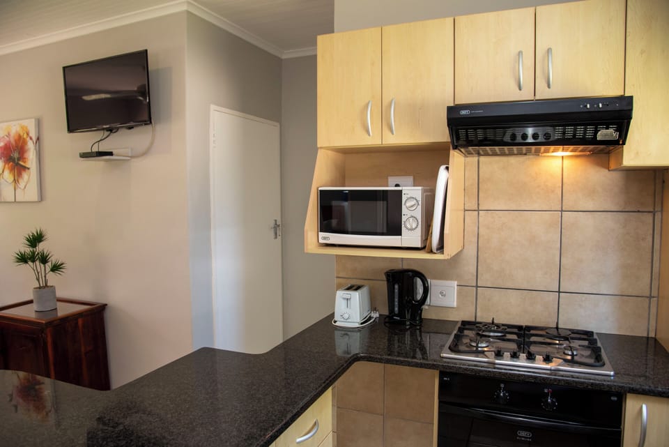 Mini-fridge, electric kettle, toaster
