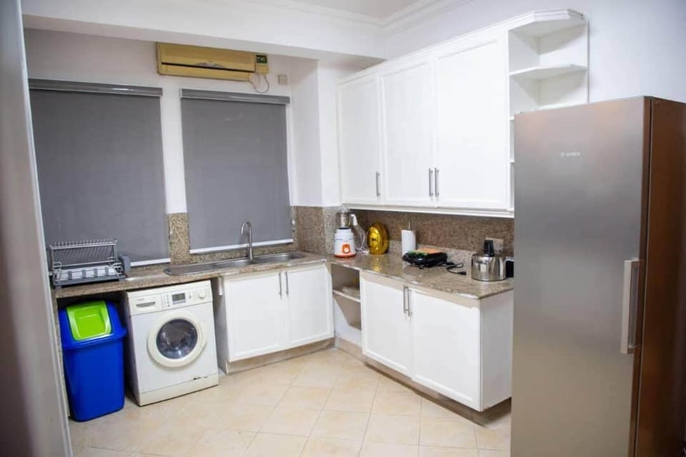Apartment, City View | Private kitchen | Full-size fridge, microwave, oven, stovetop