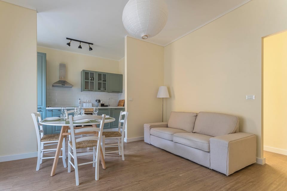 Apartment | Living area | 32-inch flat-screen TV with cable channels