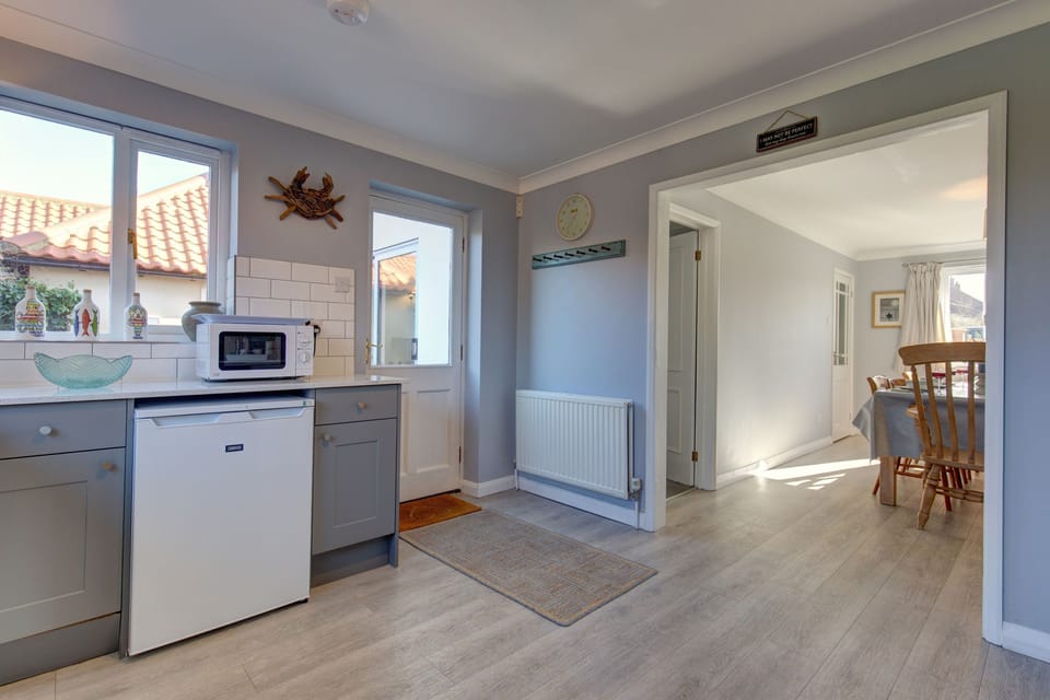 Ground floor: Through to the kitchen where a door allows access to the garden