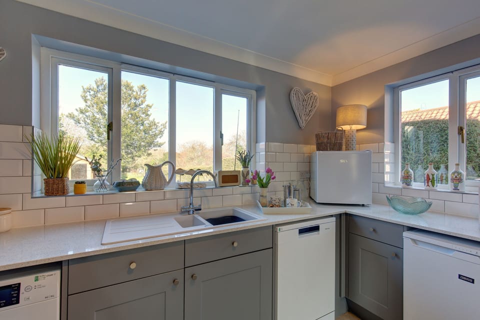 Ground floor: The kitchen overlooks the patio and garden beyond