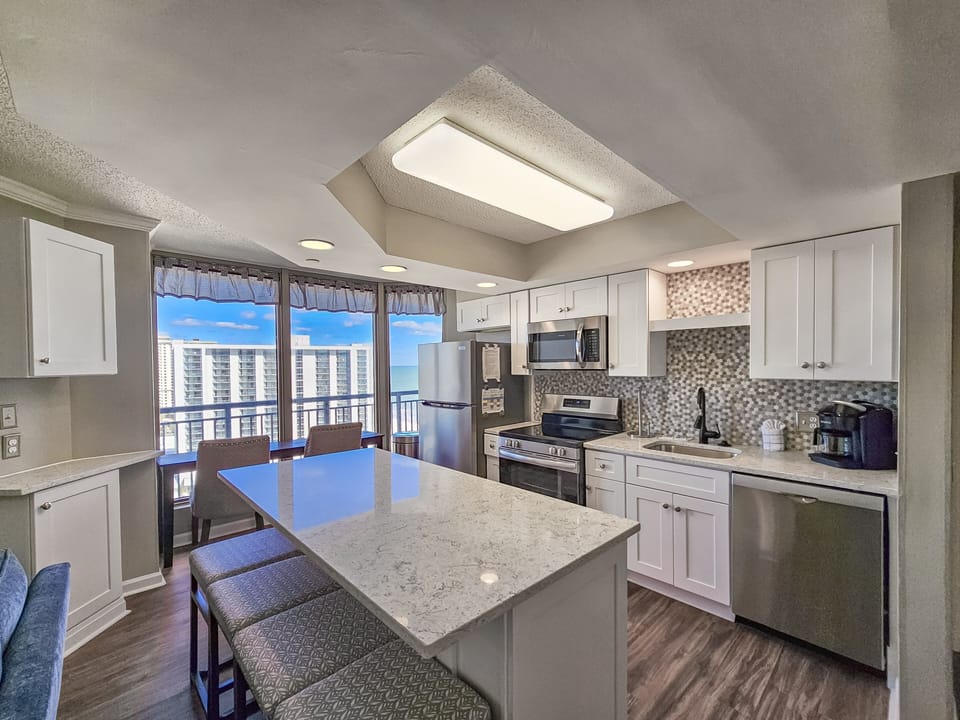 Condo, 4 Bedrooms | Private kitchen | Coffee/tea maker, fridge, oven, toaster