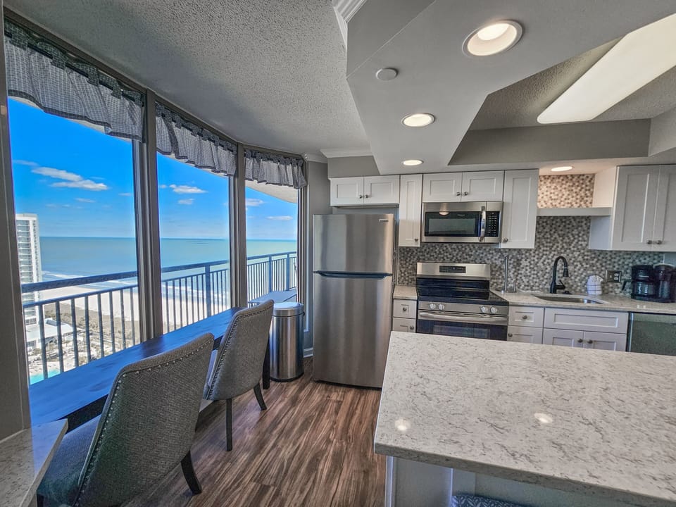Condo, 4 Bedrooms | Private kitchen | Coffee/tea maker, fridge, oven, toaster