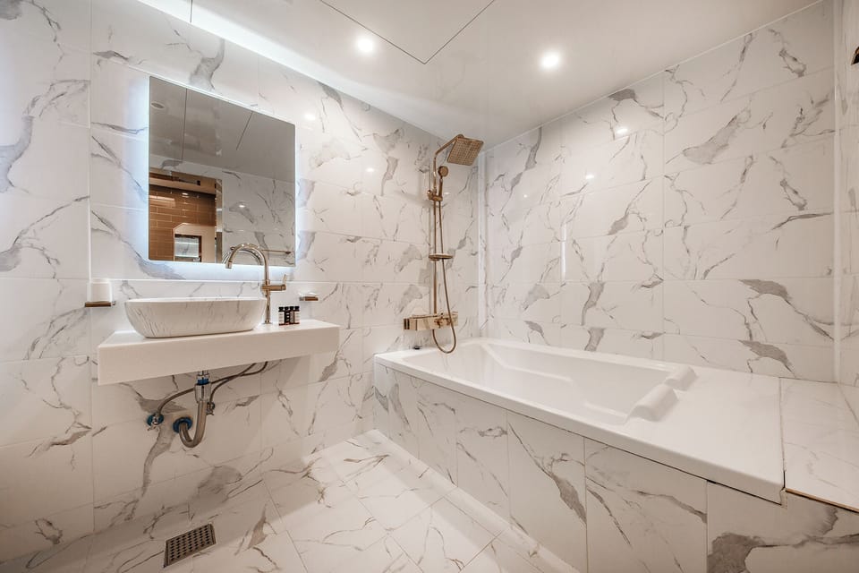 Superior Twin Room, City View | Bathroom | Hair dryer, slippers, bidet, towels