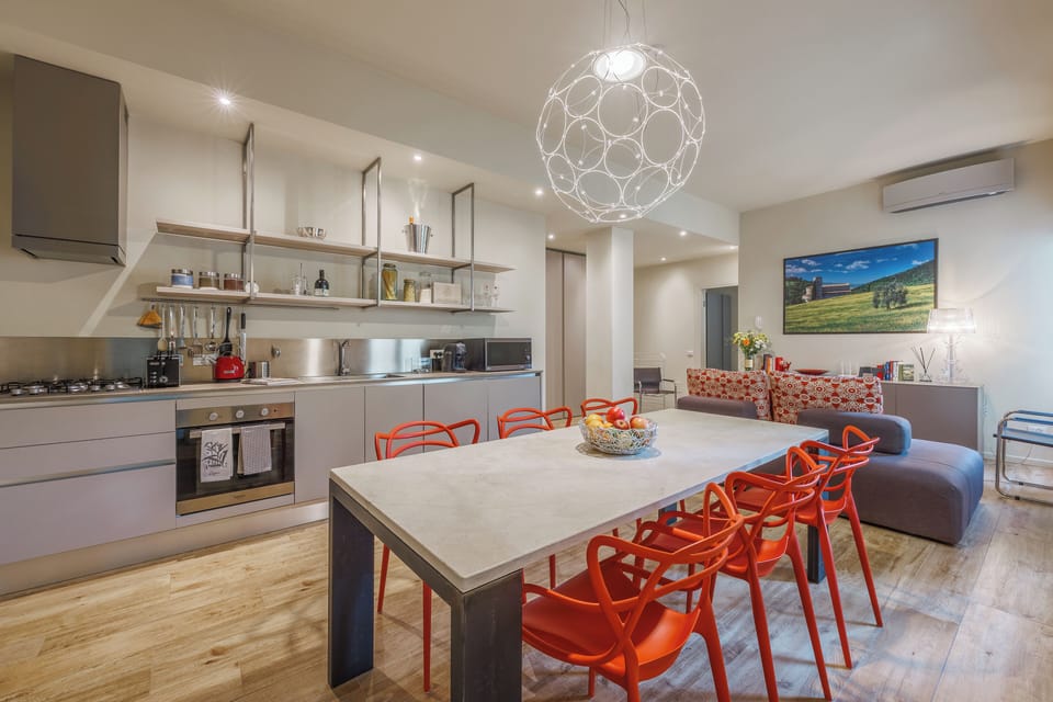 Apartment, City View | Private kitchen | Espresso maker, dining tables