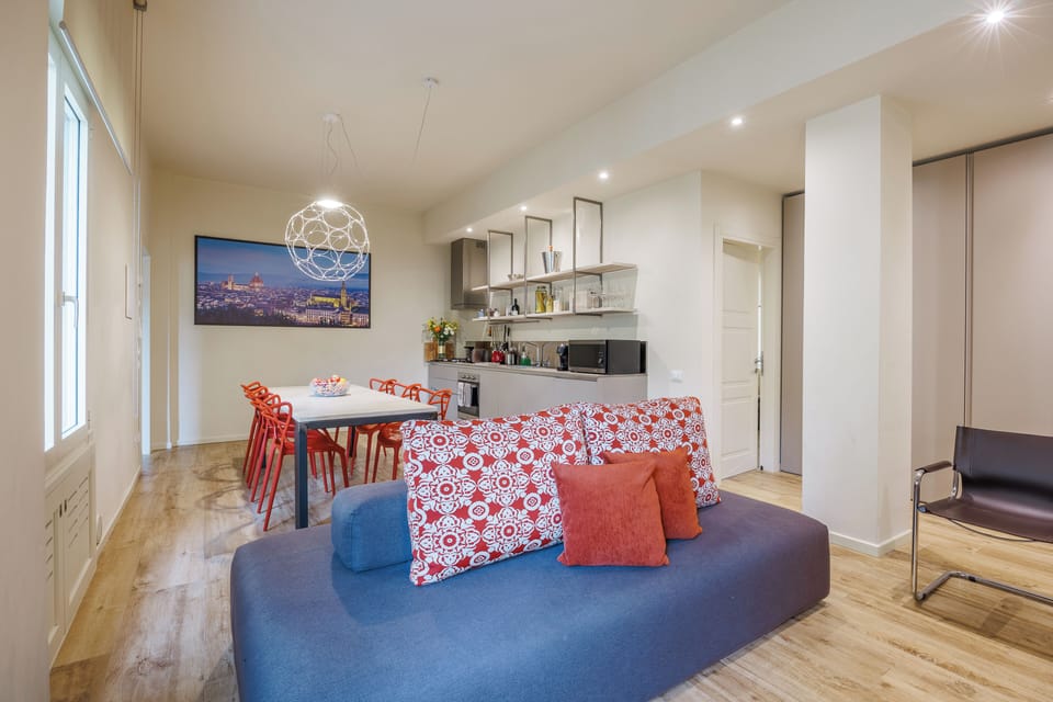Apartment, City View | Living area | 32-inch flat-screen TV with cable channels