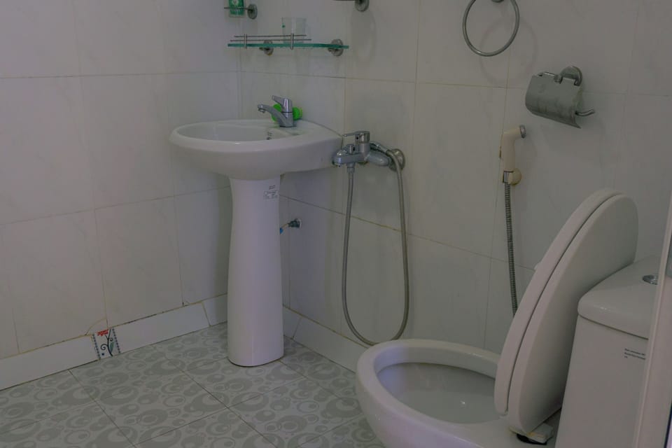 Shower, free toiletries, hair dryer, slippers