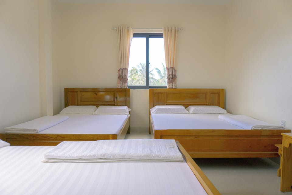 Triple Room, Multiple Beds, Pets Allowed | Desk, blackout drapes, soundproofing