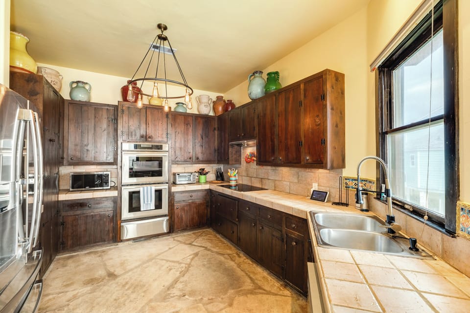 Fully equipped kitchen with stainless steel appliances