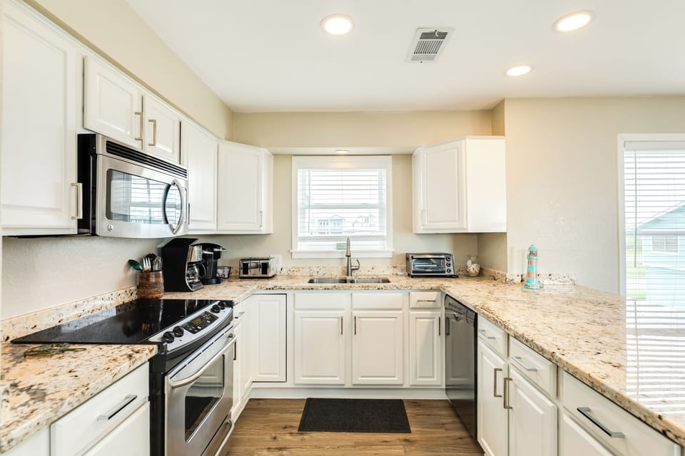 Fully equipped kitchen with stainless steel appliances