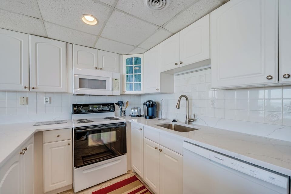 They will love the fully equipped kitchen and the white open area!