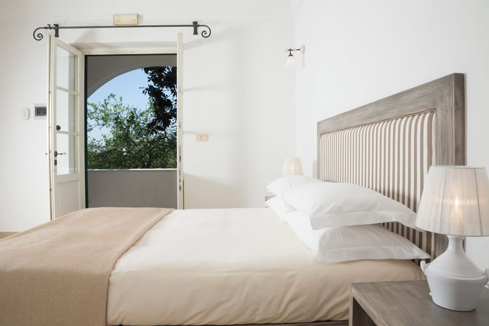 Superior Triple Room | Down comforters, cribs/infant beds, free WiFi, bed sheets