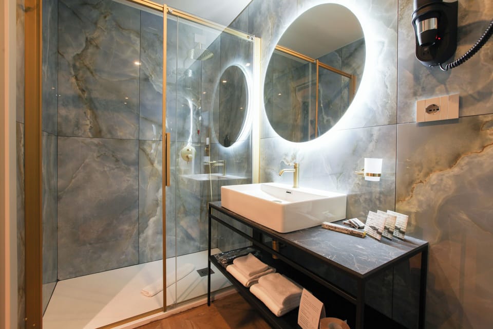 Junior Double or Twin Room, City View | Bathroom | Shower, hair dryer, slippers, bidet