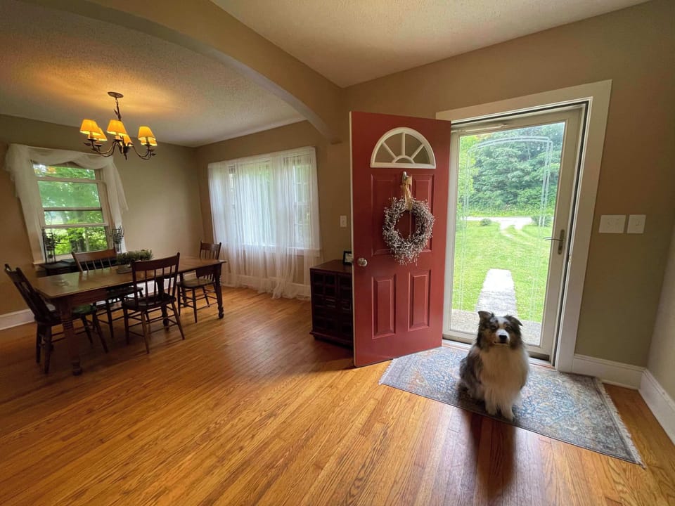 View of foyer and dining room.  We do happily welcome guests who have dogs.