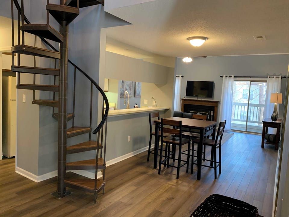 Spiral staircase leading up to the master bedroom