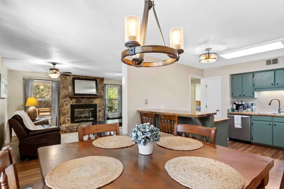 Charming dining area with ample seating, cozy decor, and an easy connection to the kitchen and living spaces. Designed for connection, comfort, and memorable meals.