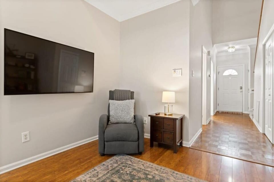 View of living room and front entry.
