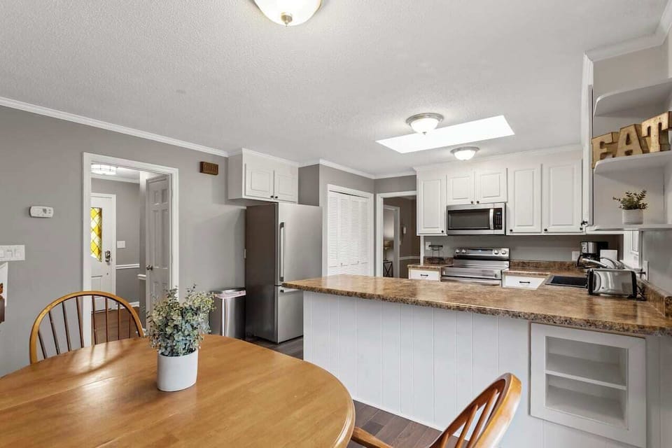 View of the breakfast nook and kitchen.