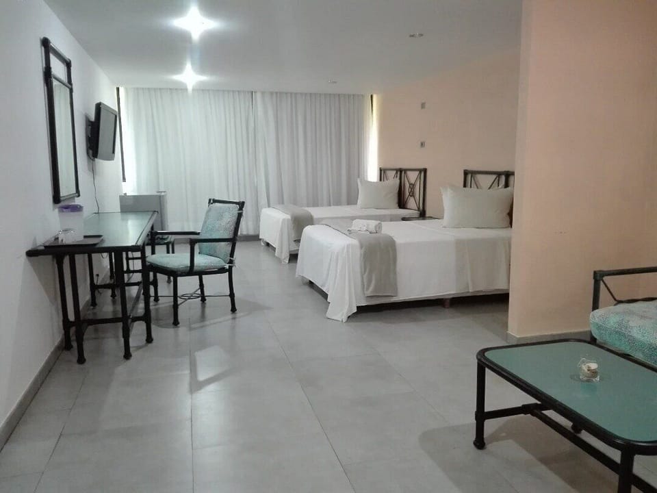 Laptop workspace, rollaway beds, bed sheets
