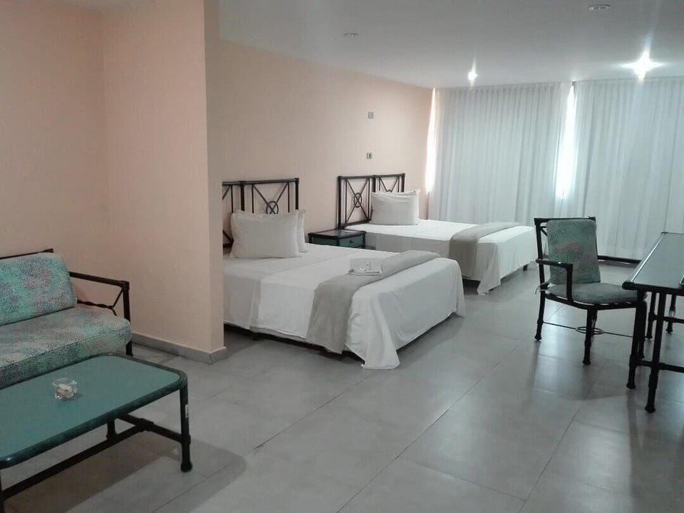 Laptop workspace, rollaway beds, bed sheets