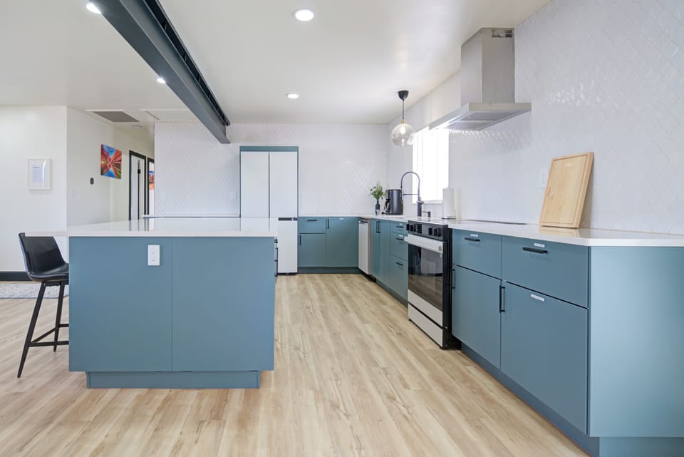Large kitchen with high end appliances, filtered water, coffee & essentials