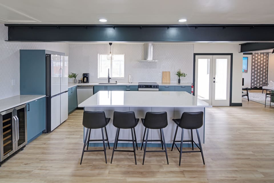 Large kitchen with high end appliances, filtered water, coffee & essentials