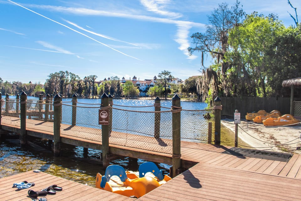 Discover the waterfront boardwalk entrance and resort-style grounds.