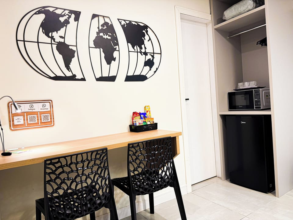 Standard Room, Private Bathroom | Minibar, desk, laptop workspace, blackout drapes
