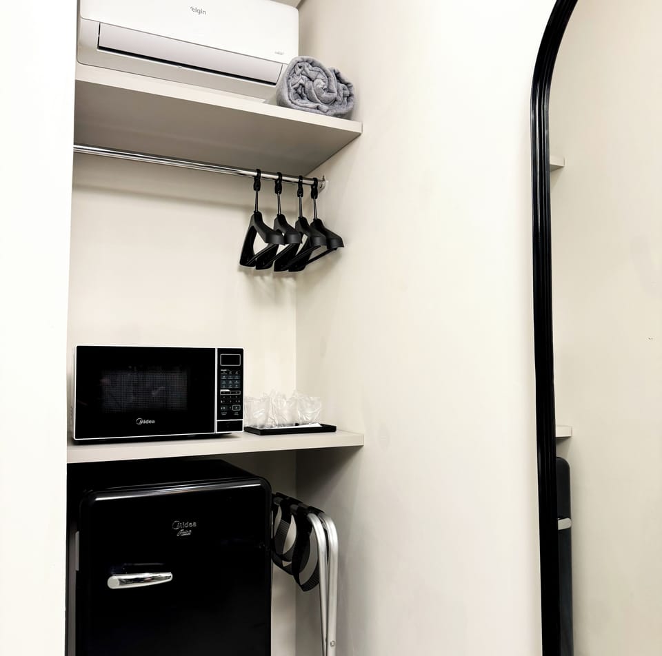 Minibar, desk, laptop workspace, blackout drapes