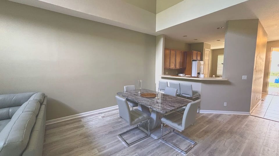 Host dinners with style at this contemporary dining set, situated perfectly between the main living area and the kitchen pass-through bar.