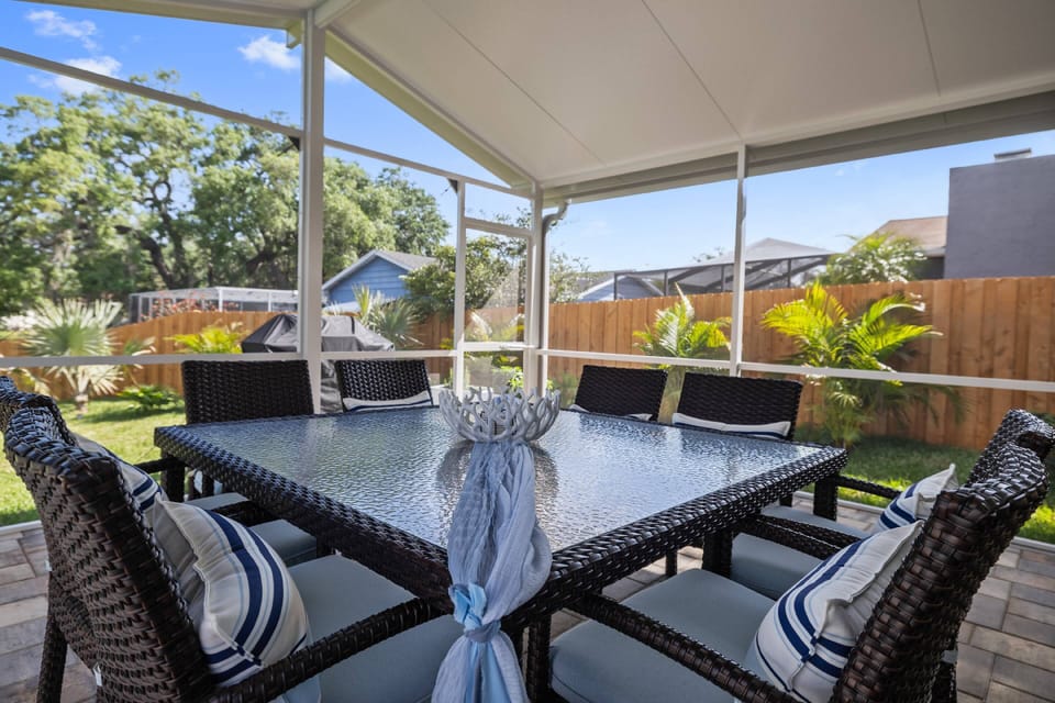 Enjoy a family dinner on the screened in lanai